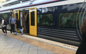 A crowded Auckland train as 'March madness', combined with a rail worker strike, begins.