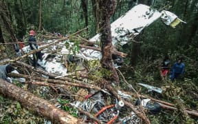 The crash site of a Swiss-made Pilatus aircraft at Menuk mountain in Oksibil.