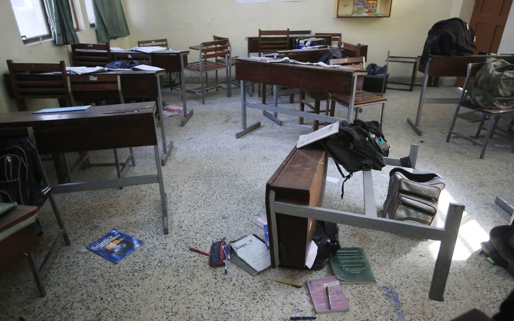 The massacre left 132 students and nine teachers dead.