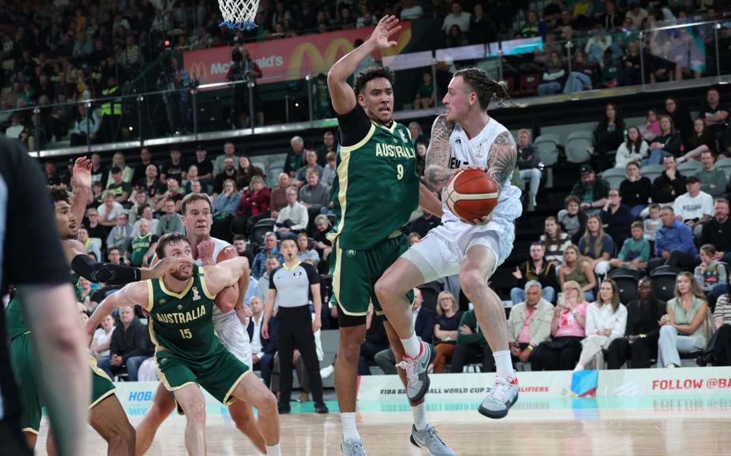 Tall Black Carlin Davison in possession against Australia.