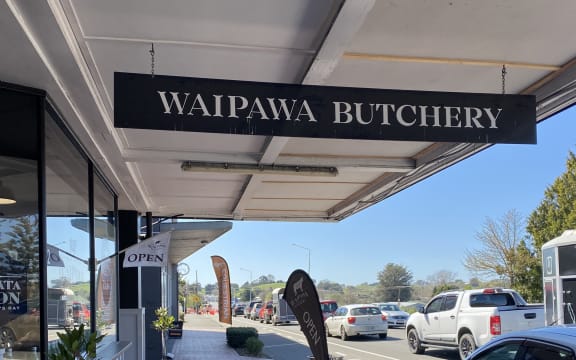 Traffic builds up around businesses on State Highway 2 in Waipawa due to road works.