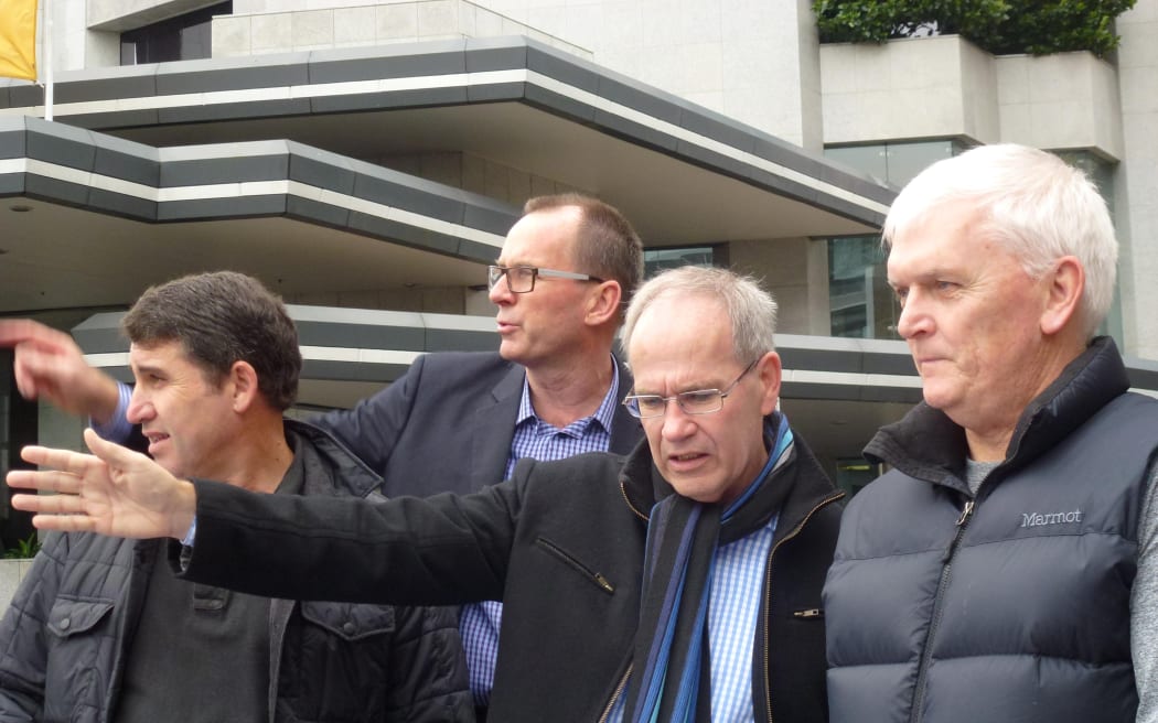 From left, Auckland Transport chair Lester Levy, rail link project manager Steve Hawkins, Mayor Len Brown and council chief executive Doug McKay discussing the route recently.