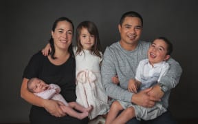 Marama and Wi Renata with twins Aotea and Neihana, 5, and baby Teia.