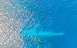 UAS footage of RNZN Divers surveying the area around HMNZS Manawanui on the Southern Coast of Upulo as part of Op Resolution.