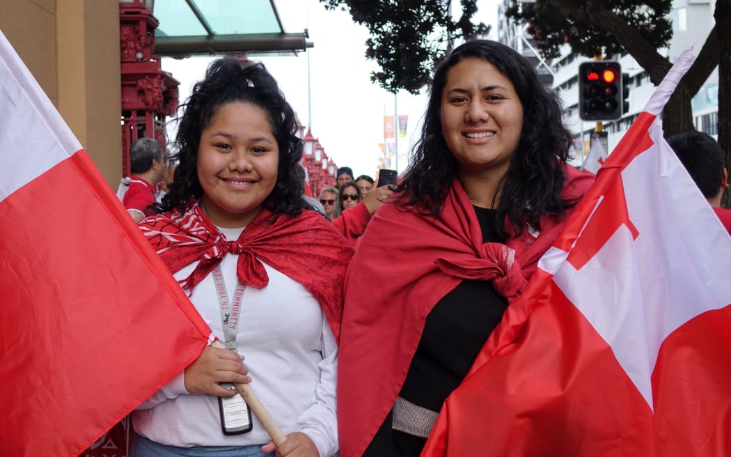 Tongan rugby league fans Serah Kalolo (left) and Torisse Laulu