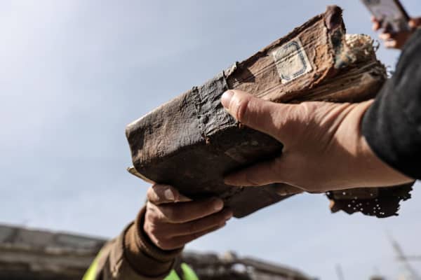 Destroyed books are among the debris of the Great Omari Mosque in Gaza City.