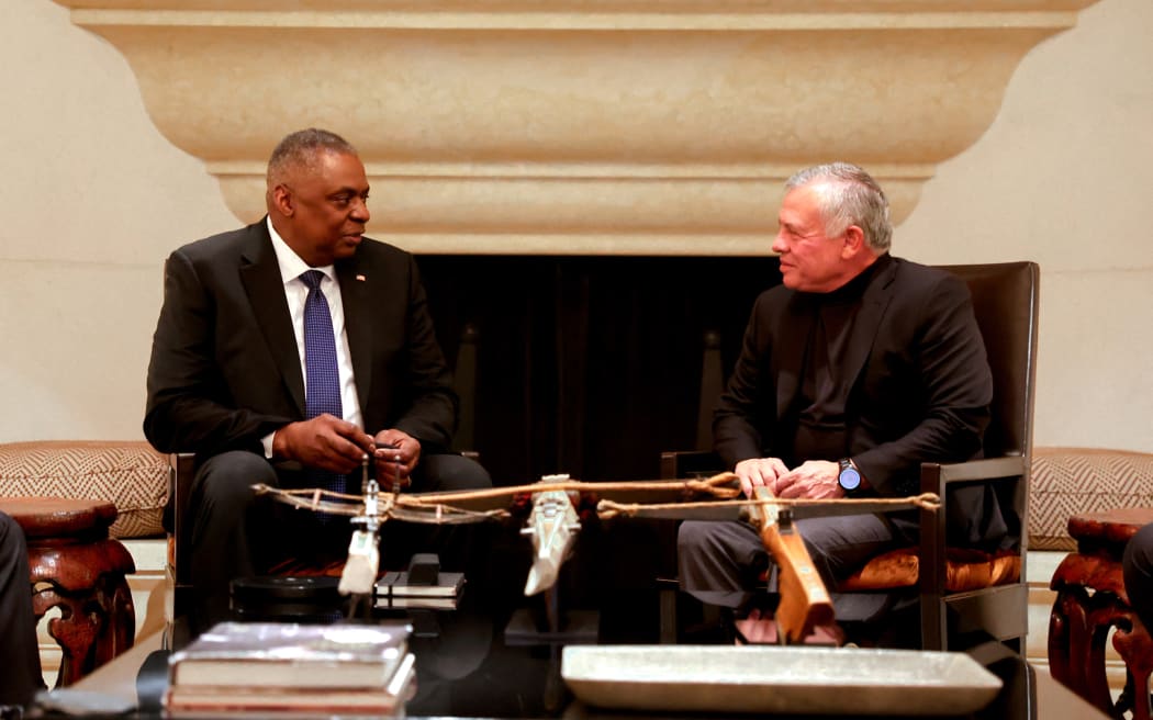 A handout picture released by the Jordanian Royal Palace shows King Abdullah II (R) meeting with US Secretary of Defence Lloyd Austin in Amman on March 5, 2023. (Photo by Jordanian Royal Palace / AFP) / RESTRICTED TO EDITORIAL USE - MANDATORY CREDIT "AFP PHOTO / JORDANIAN ROYAL PALACE / YOUSEF ALLAN" - NO MARKETING NO ADVERTISING CAMPAIGNS - DISTRIBUTED AS A SERVICE TO CLIENTS