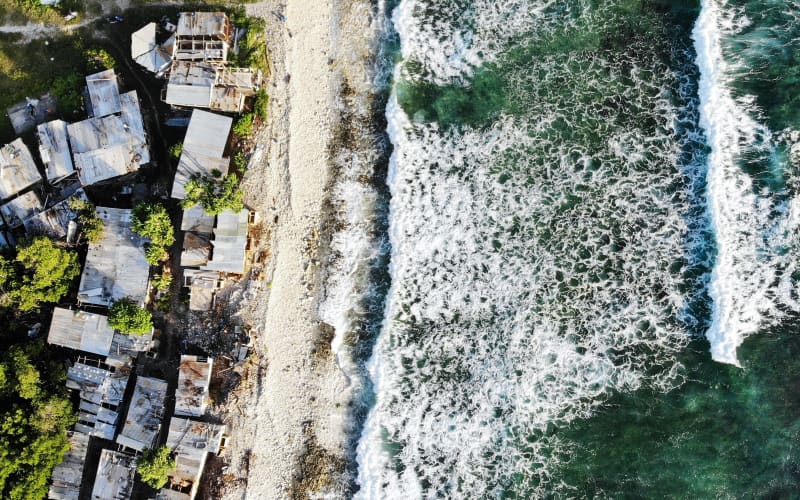 An aerial view of homes next to the Pacific Ocean on 28 November, 2019 in Funafuti, Tuvalu.