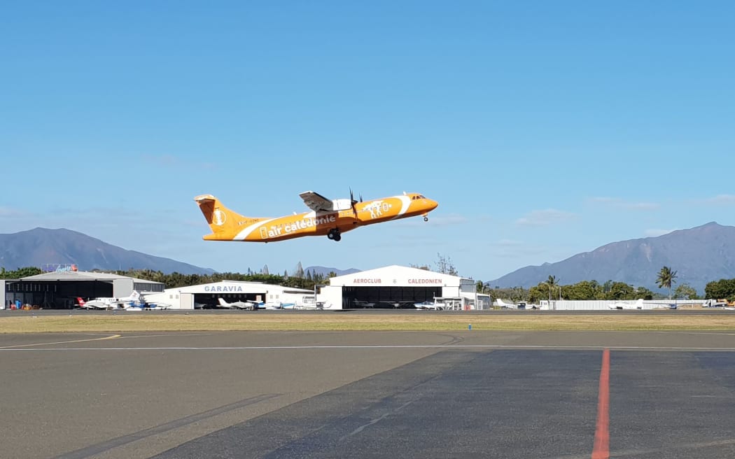 Air Caledonie ATR takes off from Magenta airport in Noumea