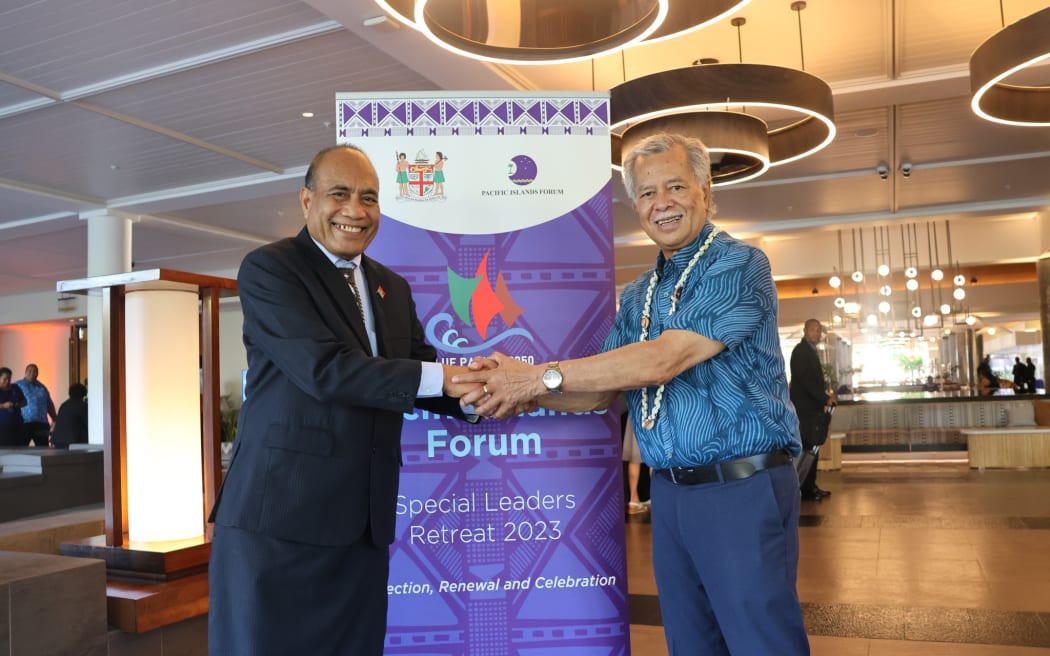 Kiribati President Taneti Maamau, left, with Pacific Islands Forum Secretary-General Henry Puna
