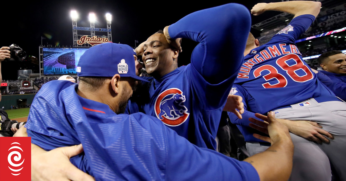 The Chicago Cubs celebrate after winning 8-7 in Game Seven of the