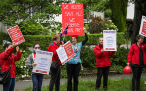 Nurses protest / strike for equal pay on Bealey Ave, Christchurch