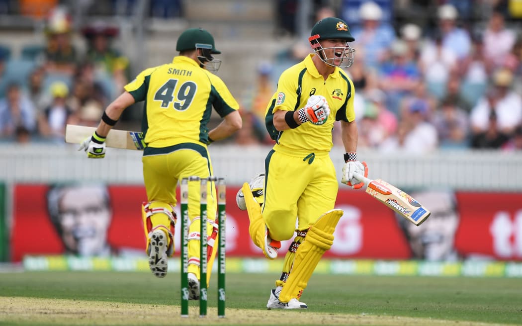 Australian batsman David Warner celebrates his century against New Zealand