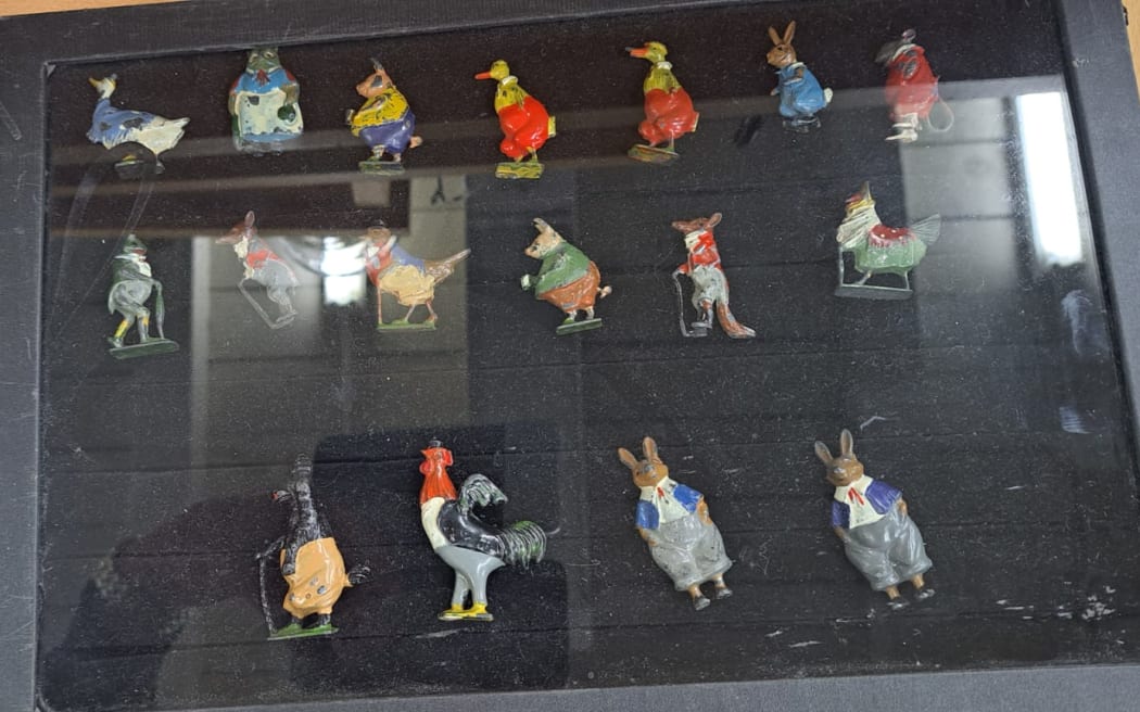 Picture of 17 hollowcast hand-painted lead figures of anthropomorphic creatures.