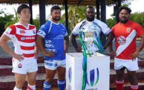 The captains pose with the World Rugby Pacific Challenge Trophy.