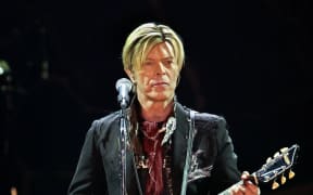 David Bowie performing in Paris in 2003.