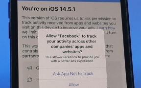 A privacy notice appears on an iPhone 12 under the new iOS 14.5.1 operating system. Developers of an application have to ask for the user's permission to allow cross-app tracking.