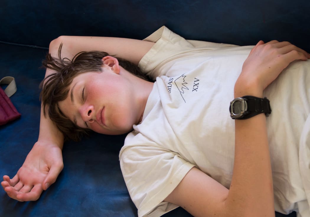 teenage boy sleeping