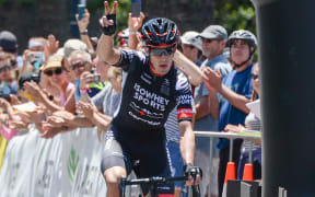 Joe Cooper crosses the finish line.