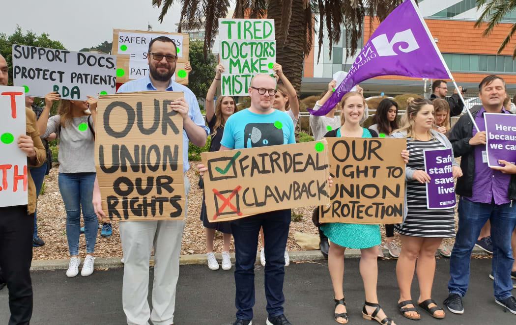 Dr Gregory O'Neill joins the picket line outside Wellington Regional Hospital