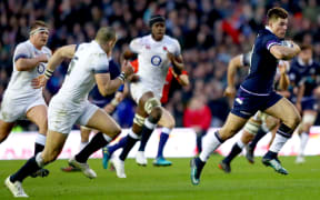 Scotland's Huw Jones breaks free against England.
