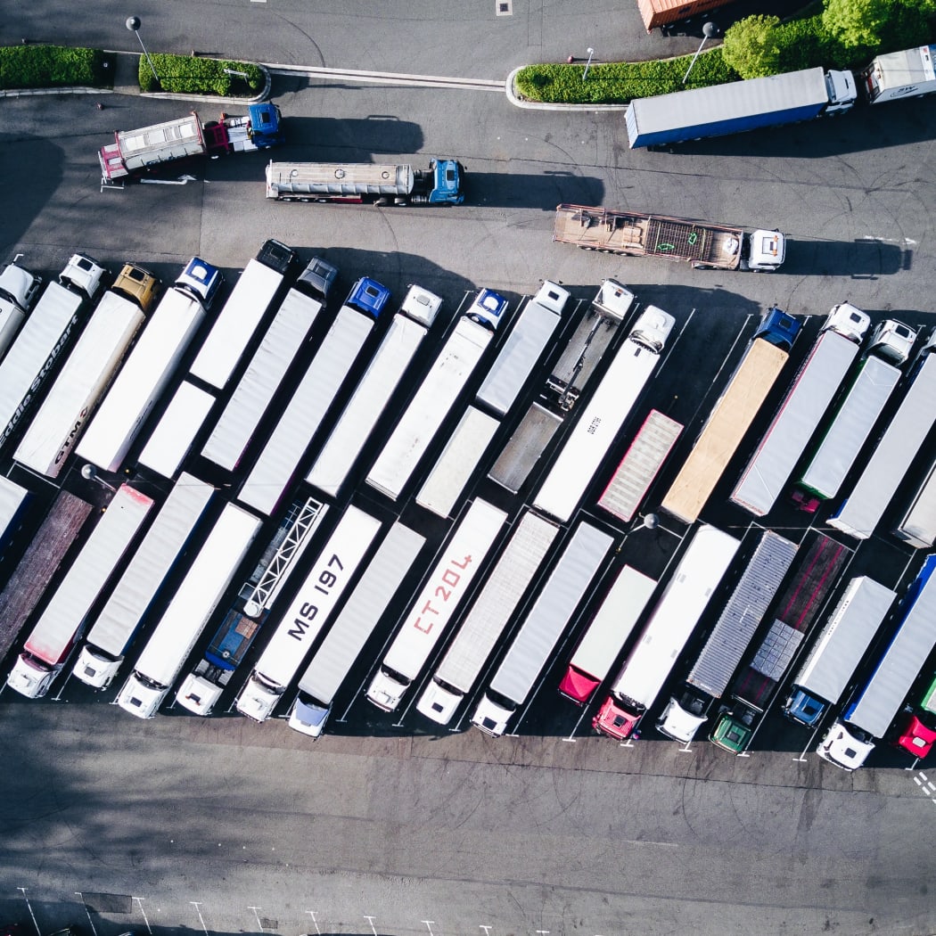 Truck and trailer units parked.