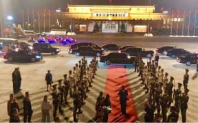 Papua New Guinea's prime minister, Peter O'Neill, is greeted with full honours as he arrives to meet China's President Xi Jinping.