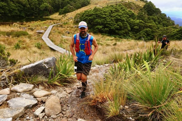 Scotty Stevenson runs up a country trail.