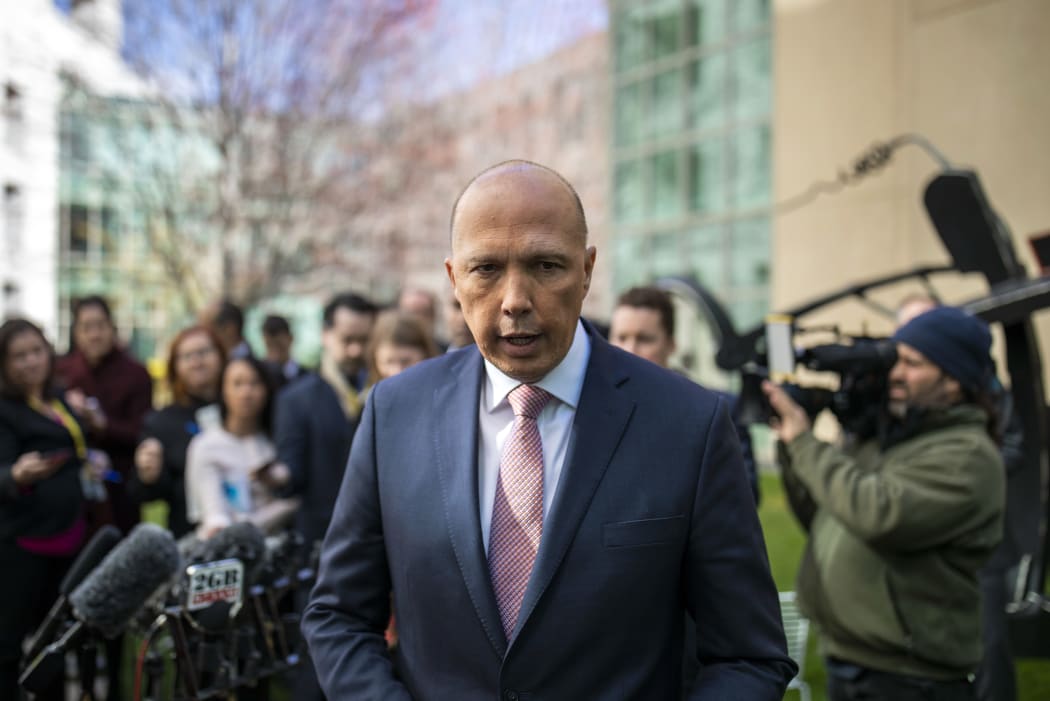 Australia's former home affairs minister, Peter Dutton, faces the media at a press conference in Canberra on August 21, 2018.