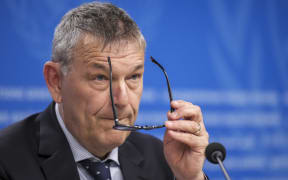 UNRWA Commissioner General Philippe Lazzarini adjusts his glasses during a press conference on the situation in the Palestinian Gaza strip.