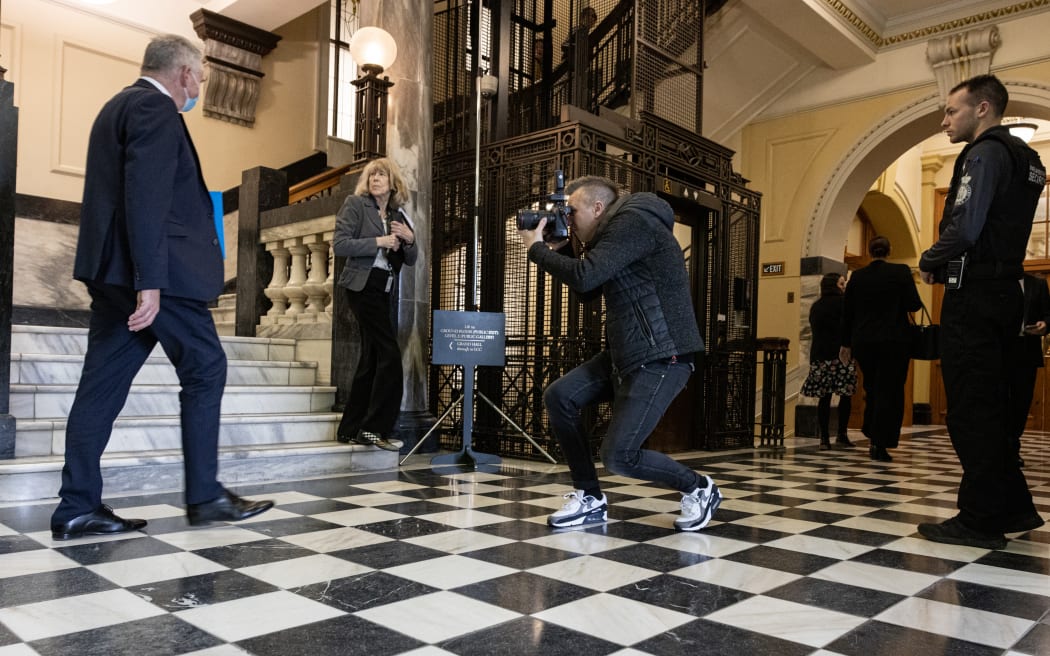 Rob Kitchin takes a photo of National MP Scott Simpson.