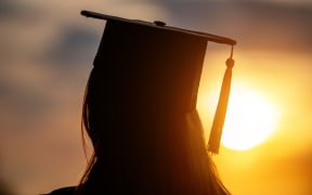 University graduate with cap.