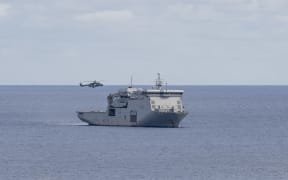 NH90 transporting loads from HMNZS Canterbury to shore at Raoul Island. Second day on Raoul Island, HMNZS Canterbury send a working party to shore to assist with vegetation clearing to allow governement agencies ease of access to working areas. NZDF contingent assisting carrying out tasks set out by the Department of Conservation, MetService and Earth Science New Zealand to carry out upgrade and maintenance tasks of critical weather, tsunami and volcano monitoring equipment and facilities on Raoul Island (Rangitahua).RNZN ship's company on shore clearing vegetation around working area needed for operation along with help from embarked forces NZ Army 5MOVs and RNZAF 3SQN to deliver and extract equipment from location via two NH90 helicoptersHMNZS Canterbury ship's company and embarked forces on Operation Calypso, deployed to the South West Pacific (2-22 February 2026).