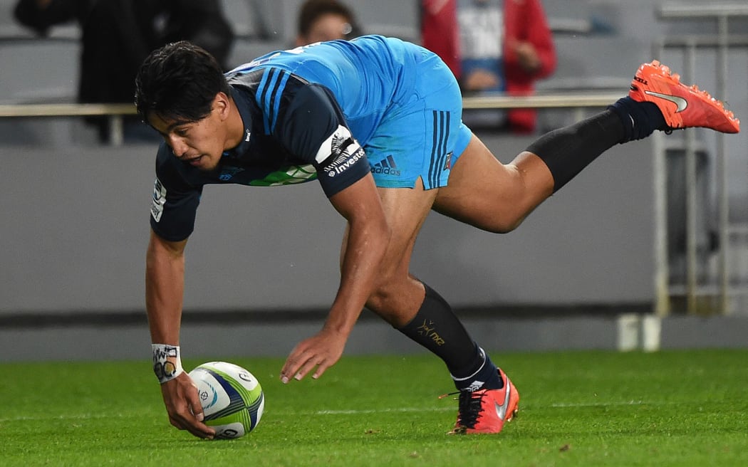 Blues winger Rieko Ioane scores a try