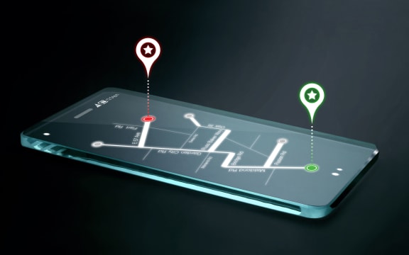 Map and navigation icons on transparent smartphone screen. GPS or Global Positioning System is a network of orbiting satellites that send precise details of their position in space back to earth.