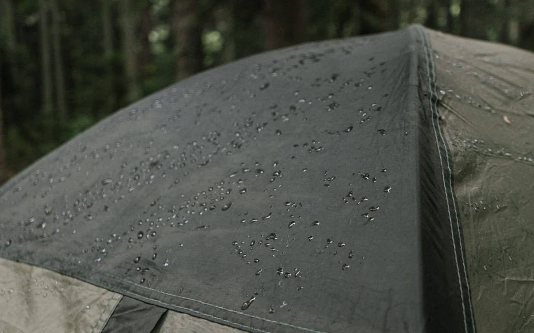 A tent in the rain.