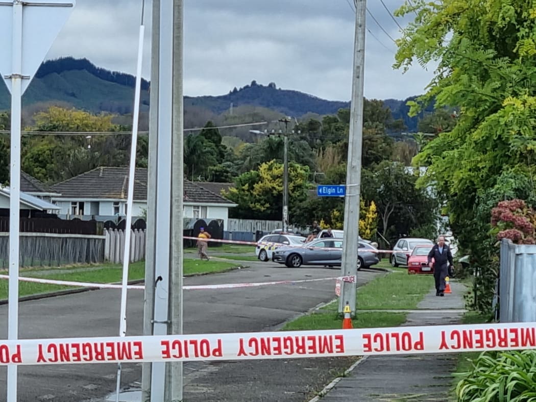 Armed police are blocking the street at the site of a overnight Gisborne homicide.