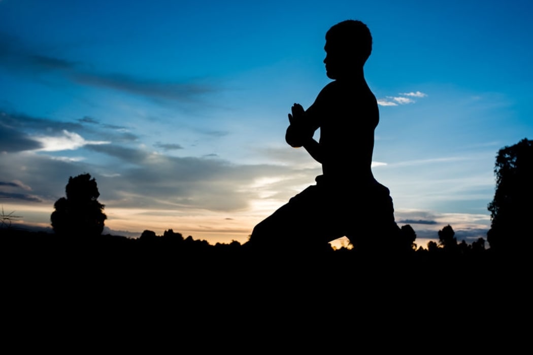 A man practising yoga