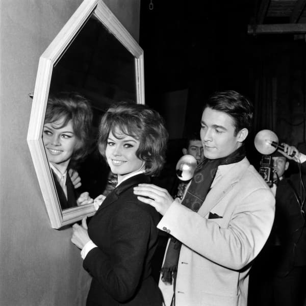 French actress Brigitte Bardot and soon-to-be-husband actor Jacques Charrier on the set of "Babette s'en va-t-en guerre" directed by Christian-Jaque, at the Saint-Maurice Studios on March 6, 1959.