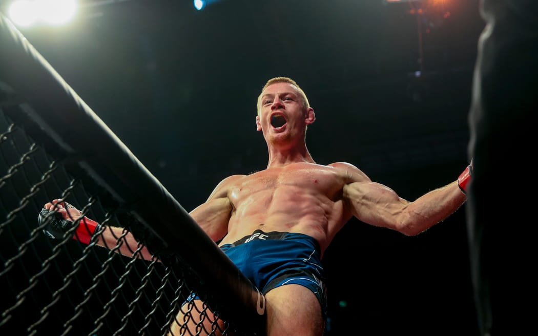 Kevin Jousset celebrates after beating Kiefer Crosbie. UFC 293, Qudos Bank Arena, Sydney Olympic Park Australia, Sunday 10th September 2023.  Copyright Photo: David Neilson / www.photosport.nz