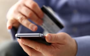Online transaction using credit card and phone.