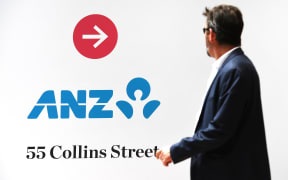 A man walks past an Australia and New Zealand Banking Group (ANZ) branch in Melbourne on October 31, 2019.