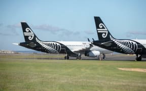 Buses and planes in Auckland sit parked during the covid-19 ouutbreak.