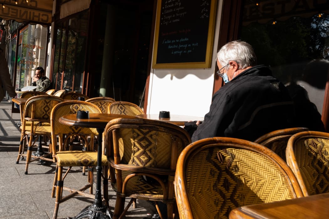 Diners at a restaurant in Paris socially distance. October 2020.