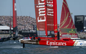 Emirates Great Britain SailGP Team helmed by Dylan Fletcher and ROCKWOOL Denmark SailGP Team helmed by Nicolai Sehested sail past the Grandstand on Race Day 1 of the Emirates Great Britain Sail Grand Prix in Portsmouth, UK. Saturday 19 July 2025. Rolex SailGP Championship Event 7 Season 2025. Photo: Ricardo Pinto for SailGP. Handout image supplied by SailGP