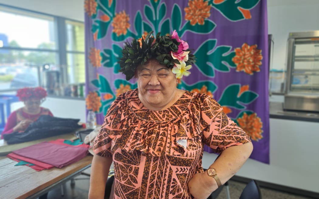 Tukua Turia, in front of Tivaivai (traditional Cook Islands quilting)