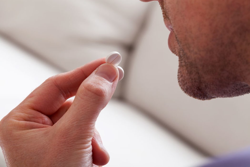 Man taking medication