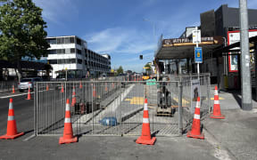Barriers surround the front of Avi’s Pies and Patisserie which the owner says has severely impacted business.
