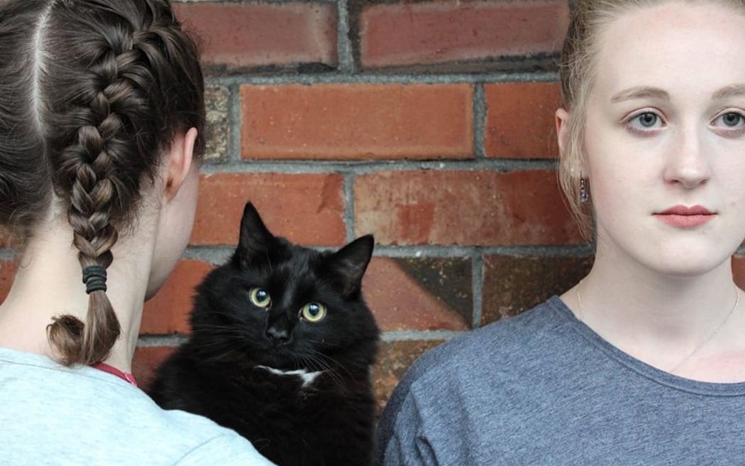 Dancers Caitlin Davey and Sarah-Louise Collins living their best cat life.