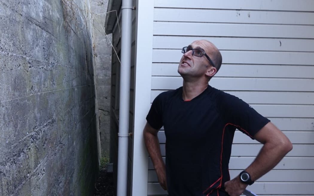 Tony Bennett surveys the retaining wall.